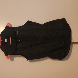 Long black Columbia quilted vest size Large.
